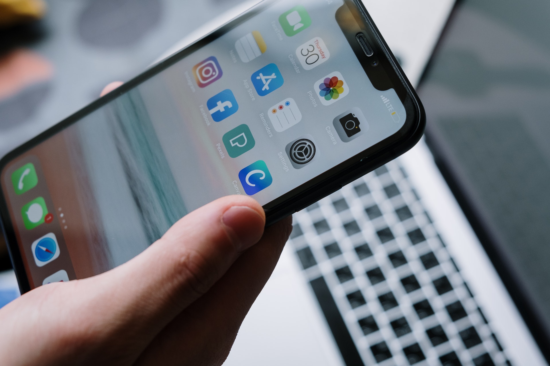 mobile phone being held