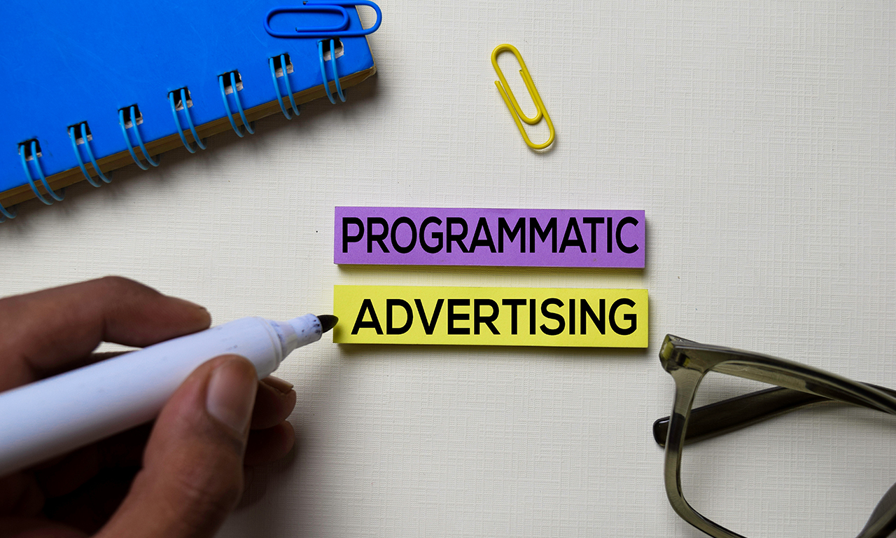 The words programmatic advertising written on labels