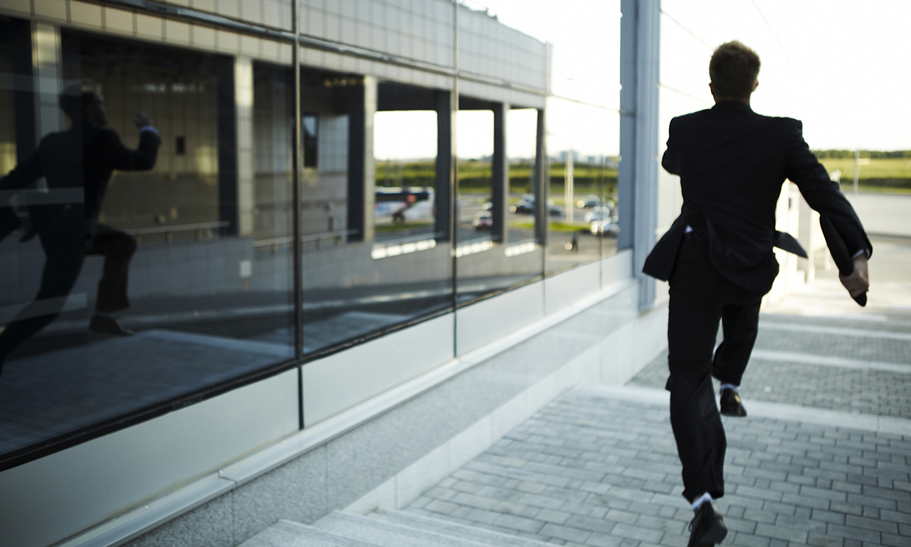 business man running from a digital marketing agency